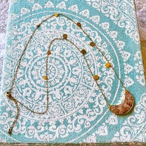 Snakeskin crescent pendant